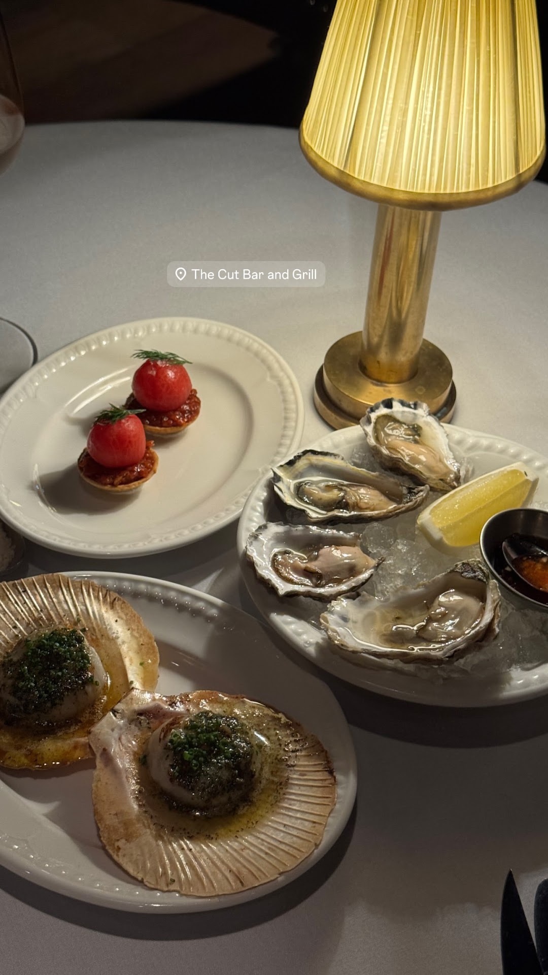 Oysters and seafood on a white tablecloth